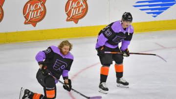 Apr 18, 2021; Philadelphia, Pennsylvania, USA; Cancer survivor Philadelphia Flyers left wing Oskar Lindblom (right) and right wing Jakub Voracek (left) wear Hockey Fights Cancer jerseys during warm ups before a game against the New York Islanders at Wells Fargo Center. Mandatory Credit: Eric Hartline-USA TODAY Sports