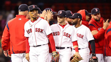 BOSTON, MA - JUNE 13: The Boston Red Sox high five each other after defeating the Texas Rangers at Fenway Park on June 13, 2019 in Boston, Massachusetts. (Photo by Adam Glanzman/Getty Images)