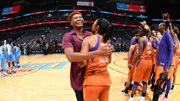 ATLANTA, GA - AUGUST 29: Angel McCoughtry #35 of the Atlanta Dream and Briann January #12 of the Phoenix Mercury hug after the game on August 29, 2019 at State Farm Arena in Atlanta, Georgia. NOTE TO USER: User expressly acknowledges and agrees that, by downloading and/or using this photograph, user is consenting to the terms and conditions of the Getty Images License Agreement. Mandatory Copyright Notice: Copyright 2019 NBAE (Photo by Scott Cunningham/NBAE via Getty Images)