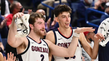 Gonzaga Bulldogs forward Drew Timme (2) and Gonzaga Bulldogs center Chet Holmgren (34) celebrate after a Gonzaga score against the Dixie State Trailblazers in the second half at McCarthey Athletic Center. The Bulldogs won 97-63. Mandatory Credit: James Snook-USA TODAY Sports