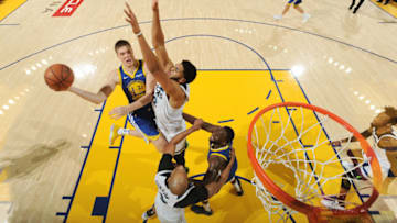 OAKLAND, CA - DECEMBER 10: Jonas Jerebko #21 of the Golden State Warriors shoots the ball against the Minnesota Timberwolves. Copyright 2018 NBAE (Photo by Noah Graham/NBAE via Getty Images)