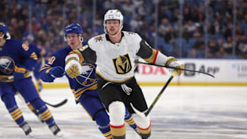 Mar 10, 2022; Buffalo, New York, USA; Vegas Golden Knights center Jack Eichel (9) goes after a loose puck during the first period against the Buffalo Sabres at KeyBank Center. Mandatory Credit: Timothy T. Ludwig-USA TODAY Sports