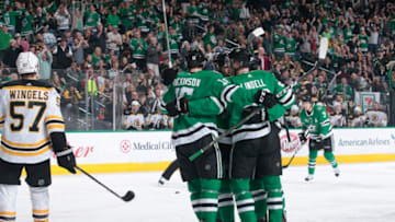 DALLAS, TX - MARCH 23: Jason Dickinson #16, Esa Lindell #23 and the Dallas Stars celebrate a goal against the Boston Bruins at the American Airlines Center on March 23, 2018 in Dallas, Texas. (Photo by Glenn James/NHLI via Getty Images)