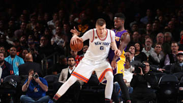 NEW YORK, NY - FEBRUARY 6: Kristaps Porzingis #6 of the New York Knicks handles the ball against Julius Randle #30 of the Los Angeles Lakers during a game on February 6, 2017 at Madison Square Garden in New York City, New York. Copyright 2017 NBAE (Photo by Nathaniel S. Butler/NBAE via Getty Images)