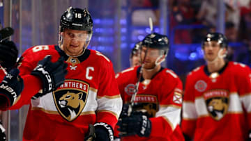 SUNRISE, FL - APRIL 6: Aleksander Barkov #16 of the Florida Panthers celebrates his Panthers single season record scoring goal with teammates against the New Jersey Devils in the second period at the BB&T Center on April 6, 2019 in Sunrise, Florida. (Photo by Eliot J. Schechter/NHLI via Getty Images)
