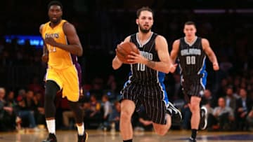 LOS ANGELES, CA - MARCH 08: Evan Fournier #10 of the Orlando Magic looks to make a pass on the fastbreak during the NBA game against the Los Angeles Lakers at Staples Center on March 8, 2016 in Los Angeles, California. NOTE TO USER: User expressly acknowledges and agrees that, by downloading and or using this photograph, User is consenting to the terms and conditions of the Getty Images License Agreement. (Photo by Victor Decolongon/Getty Images)