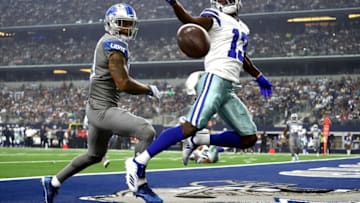 ARLINGTON, TX - SEPTEMBER 30: Michael Gallup #13 of the Dallas Cowboys goes up for a pass against Darius Slay #23 of the Detroit Lions in the first quarter at AT&T Stadium on September 30, 2018 in Arlington, Texas. (Photo by Ronald Martinez/Getty Images)
