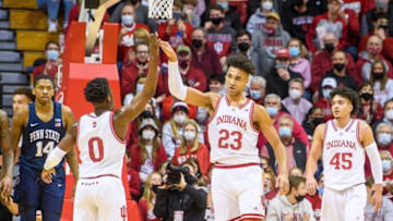 Indiana's Xavier Johnson (0) aand Trayce Jackson-Davis (23) celebrate a Jackson-Davis block during the first half of the Indiana versus Penn State men's basketball game at Simon Skjodt Assembly Hall.Iu Psu Bb 1h Johnson Tjd