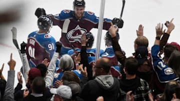 DENVER, CO - NOVEMBER 09: Nazem Kadri (91) of the Colorado Avalanche, Tyson Jost (17) and J.T. Compher (37) swarm teammate Cale Makar (8) after Makar scored a goal in the second period against the Columbus Blue Jackets at the Pepsi Center November 09, 2019. (Photo by Andy Cross/MediaNews Group/The Denver Post via Getty Images)