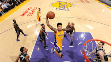 LOS ANGELES, CA - APRIL 7: Brandon Ingram #14 of the Los Angeles Lakers goes up for a dunk during a game against the Sacramento Kings on April 7, 2017 at STAPLES Center in Los Angeles, California. NOTE TO USER: User expressly acknowledges and agrees that, by downloading and/or using this photograph, user is consenting to the terms and conditions of the Getty Images License Agreement. Mandatory Copyright Notice: Copyright 2017 NBAE (Photo by Andrew D. Bernstein/NBAE via Getty Images)