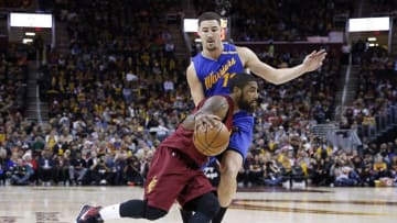 Dec 25, 2016; Cleveland, OH, USA; Cleveland Cavaliers guard Kyrie Irving (2) drives to the basket against Golden State Warriors forward Klay Thompson (11) at Quicken Loans Arena. Cleveland defeats Golden State 109-108. Mandatory Credit: Brian Spurlock-USA TODAY Sports