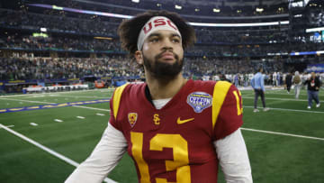 Jan 2, 2023; Arlington, Texas, USA; USC Trojans quarterback Caleb Williams (13) walks off the field after the game against the Tulane Green Wave in the 2023 Cotton Bowl at AT&T Stadium. Mandatory Credit: Tim Heitman-USA TODAY Sports