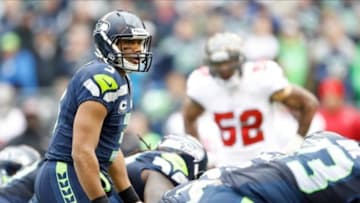 Nov 3, 2013; Seattle, WA, USA; Seattle Seahawks quarterback Russell Wilson (3) calls a an audible from the line against the Tampa Bay Buccaneers during the third quarter at CenturyLink Field. Mandatory Credit: Joe Nicholson-USA TODAY Sports