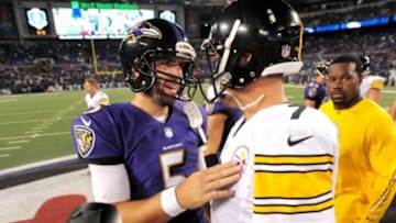 Sep 11, 2014; Baltimore, MD, USA; Baltimore Ravens quarterback Joe Flacco (5) talks to Pittsburgh Steelers quarterback Ben Roethlisberger (7) after the game at M&T Bank Stadium. The Ravens won 26-6. Mandatory Credit: Evan Habeeb-USA TODAY Sports