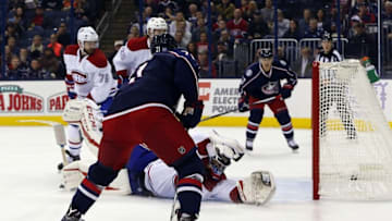 Nov 4, 2016; Columbus, OH, USA; Columbus Blue Jackets left wing Nick Foligno (71) scores over a sliding Montreal Canadiens goalie Al Montoya (35) during the second period at Nationwide Arena. Mandatory Credit: Russell LaBounty-USA TODAY Sports