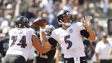 Sep 20, 2015; Oakland, CA, USA; Baltimore Ravens quarterback Joe Flacco (5) prepares to throw a pass against the Oakland Raiders in the first quarter at O.co Coliseum. The Raiders recovered the fumble. Mandatory Credit: Cary Edmondson-USA TODAY Sports