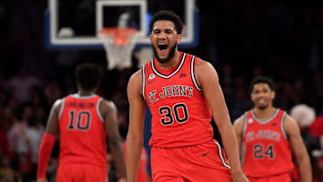 NEW YORK, NEW YORK - MARCH 11: LJ Figueroa #30 of the St. John's basketball team reacts after scoring in the second half against the Georgetown Hoyas during the first round of the Big East Basketball Tournament at Madison Square Garden on March 11, 2020 in New York City. The St. John's Red Storm won 75-62. (Photo by Sarah Stier/Getty Images)