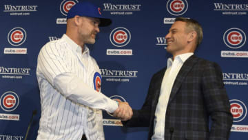 CHICAGO, ILLINOIS - OCTOBER 28: David Ross, new manager of the Chicago Cubs (L) and Jed Hoyer, general manager of the Cubs, shake hands as Ross is introduced to the media at Wrigley Field on October 28, 2019 in Chicago, Illinois. (Photo by David Banks/Getty Images)