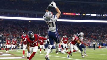 Dec 13, 2015; Houston, TX, USA; New England Patriots tight end Rob Gronkowski (87) catches a touchdown pass past Houston Texans strong safety Quintin Demps (27) during the second quarter at NRG Stadium. Mandatory Credit: Kevin Jairaj-USA TODAY Sports