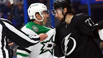 Jan 15, 2022; Tampa, Florida, USA; Dallas Stars defenseman Joel Hanley (44) and Tampa Bay Lightning left wing Pierre-Edouard Bellemare (41) talk during the first period at Amalie Arena. Mandatory Credit: Kim Klement-USA TODAY Sports