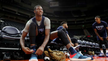 SALT LAKE CITY, UT - JULY 1: Jaren Jackson Jr. of the Memphis Grizzlies ties his sneakers before a team practice at Utah Summer League on July 1, 2018 at Vivint Smart Home Arena in Salt Lake City, Utah. NOTE TO USER: User expressly acknowledges and agrees that, by downloading and or using this photograph, User is consenting to the terms and conditions of the Getty Images License Agreement. Mandatory Copyright Notice: Copyright 2018 NBAE (Photo by Joe Murphy/NBAE via Getty Images)