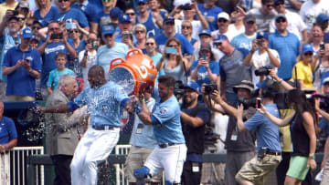 May 29, 2016; Kansas City, MO, USA; Kansas City Royals catcher Drew Butera (9) dumps a water cooler on center fielder Lorenzo Cain (6) after the game against the Chicago White Sox at Kauffman Stadium. Kansas City won 5-4. Mandatory Credit: John Rieger-USA TODAY Sports