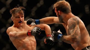 GLENDALE, ARIZONA - JUNE 12: Drew Dober (L) fights Brad Riddell of New Zealand during their UFC 263 lightweight match at Gila River Arena on June 12, 2021 in Glendale, Arizona.