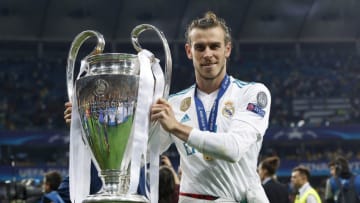 KIEV, UKRAINE - MAY 26: Gareth Bale of Real Madrid celebrates with The UEFA Champions League trophy following his sides victory in the UEFA Champions League Final between Real Madrid and Liverpool at NSC Olimpiyskiy Stadium on May 26, 2018 in Kiev, Ukraine. (Photo by Angel Martinez/Real Madrid via Getty Images)