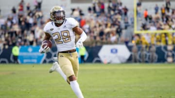 ATLANTA, GA - NOVEMBER 17: Defensive back Juanyeh Thomas #28 of the Georgia Tech Yellow Jackets runs the ball down field during the first quarter of their game against the Virginia Cavaliers at Bobby Dodd Stadium on November 17, 2018 in Atlanta, Georgia. (Photo by Michael Chang/Getty Images)