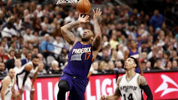 Dec 28, 2016; San Antonio, TX, USA; Phoenix Suns small forward P.J. Tucker (17) loses control of the ball as he drives to the basket against the San Antonio Spurs during the first half at AT&T Center. Mandatory Credit: Soobum Im-USA TODAY Sports