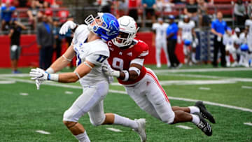 PISCATAWAY, NJ - SEPTEMBER 22: Saquan Hampton #9 of the Rutgers Scarlet Knights commits passer interference against Charlie Jones #17 of the Buffalo Bulls during the third quarter at HighPoint.com Stadium on September 22, 2018 in Piscataway, New Jersey. Buffalo won 42-13. (Photo by Corey Perrine/Getty Images)