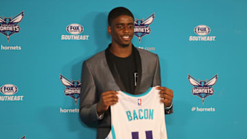 CHARLOTTE, NC - JUNE 23: Rich Cho, General Manager of the Charlotte Hornets, introduces Dwayne Bacon and Malik Monk to the media at a press conference in Charlotte, North Carolina on June 23, 2017 at the Spectrum Center. NOTE TO USER: User expressly acknowledges and agrees that, by downloading and or using this photograph, User is consenting to the terms and conditions of the Getty Images License Agreement. Mandatory Copyright Notice: Copyright 2017 NBAE (Photo by Brock Williams-Smith/NBAE via Getty Images)