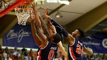 LAHAINA, HI - NOVEMBER 19: Ryan Welage #32 of the Xavier Musketeers loses position to Horace Spencer #0 and Anfernee McLemore #24 of the Auburn Tigers as they try to get control of a loose ball at Lahaina Civic Center on November 19, 2018 in Lahaina, Hawaii. (Photo by Darryl Oumi/Getty Images)