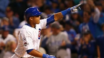 Oct 12, 2015; Chicago, IL, USA; Chicago Cubs shortstop Starlin Castro (13) celebrates after hitting a home run during the fourth inning against the St. Louis Cardinals in game three of the NLDS at Wrigley Field. Mandatory Credit: Jerry Lai-USA TODAY Sports