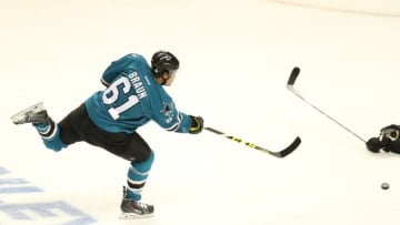 Jun 4, 2016; San Jose, CA, USA; San Jose Sharks defenseman Justin Braun (61) shoots and scores past the block attempt by Pittsburgh Penguins right wing Patric Hornqvist (72) in the first period of game three of the 2016 Stanley Cup Final at SAP Center at San Jose. Mandatory Credit: John Hefti-USA TODAY Sports