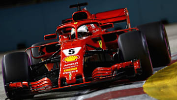 SINGAPORE - SEPTEMBER 16: Sebastian Vettel of Germany driving the (5) Scuderia Ferrari SF71H on track during the Formula One Grand Prix of Singapore at Marina Bay Street Circuit on September 16, 2018 in Singapore. (Photo by Mark Thompson/Getty Images)