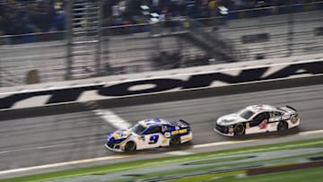 DAYTONA BEACH, FL - FEBRUARY 15: Chase Elliott, driver of the #9 NAPA Auto Parts Chevrolet, takes the checkered flag ahead of Kevin Harvick, driver of the #4 Jimmy John's Ford, to win the Monster Energy NASCAR Cup Series Can-Am Duel 2 at Daytona International Speedway on February 15, 2018 in Daytona Beach, Florida. (Photo by Jared C. Tilton/Getty Images)