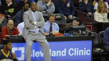 Mar 30, 2014; Cleveland, OH, USA; Cleveland Cavaliers head coach Mike Brown watches in the first quarter against the Indiana Pacers at Quicken Loans Arena. Mandatory Credit: David Richard-USA TODAY Sports