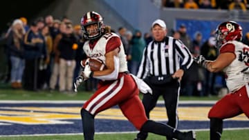 MORGANTOWN, WV - NOVEMBER 23: Caleb Kelly #19 of the Oklahoma Sooners recovers a fumble for a 10 yard touchdown against the West Virginia Mountaineers on November 23, 2018 at Mountaineer Field in Morgantown, West Virginia. (Photo by Justin K. Aller/Getty Images)