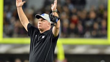 Oct 24, 2015; Starkville, MS, USA; Kentucky Wildcats head coach Mark Stoops celebrates after a replay confirmed a touchdown during the first quarter of the game against the Mississippi State Bulldogs at Davis Wade Stadium. Mandatory Credit: Matt Bush-USA TODAY Sports