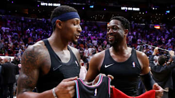 Dwyane Wade #3 of the Miami Heat excahnges jerseys with Bradley Beal #3 of the Washington Wizards at American Airlines Arena (Photo by Michael Reaves/Getty Images)