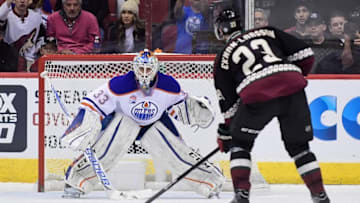 Nov 25, 2016; Glendale, AZ, USA; Arizona Coyotes defenseman Oliver Ekman-Larsson (23) scores on Edmonton Oilers goalie Cam Talbot (33) during a shootout at Gila River Arena. Mandatory Credit: Matt Kartozian-USA TODAY Sports