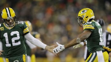 Jan 8, 2017; Green Bay, WI, USA; Green Bay Packers quarterback Aaron Rodgers (12) celebrates with wide receiver Randall Cobb (18) after a touchdown in the third quarter against the New York Giants in the NFC Wild Card playoff football game at Lambeau Field. Mandatory Credit: Dan Powers/The Post-Crescent via USA TODAY Sports