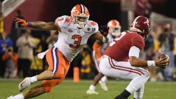 SANTA CLARA, CA - JANUARY 07: Jalen Hurts #2 of the Alabama Crimson Tide is pursued by Xavier Thomas #3 of the Clemson Tigers in the CFP National Championship presented by AT&T at Levi's Stadium on January 7, 2019 in Santa Clara, California. (Photo by Harry How/Getty Images)