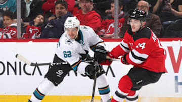 NEWARK, NEW JERSEY - FEBRUARY 20: Kevin Labanc #62 of the San Jose Sharks skates against Joey Anderson #14 of the New Jersey Devils at the Prudential Center on February 20, 2020 in Newark, New Jersey. The Devils defeated the Sharks 2-1. (Photo by Bruce Bennett/Getty Images)