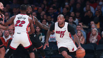 Miami Heat forward P.J. Tucker (17) dribbles as forward Jimmy Butler (22) screens New York Knicks forward Julius Randle(Vincent Carchietta-USA TODAY Sports)