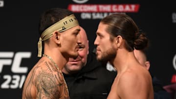 TORONTO, CANADA - DECEMBER 07: (L-R) Opponents Max Holloway and Brian Ortega face-off during the UFC 231 weigh-in at Scotiabank Arena on December 7, 2018 in Toronto, Canada. (Photo by Josh Hedges/Zuffa LLC/Zuffa LLC via Getty Images)