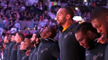 SAN ANTONIO,TX - MARCH 23 : The Utah Jazz stand together during National Anthem at AT&T Center on March 23, 2018 in San Antonio, Texas. NOTE TO USER: User expressly acknowledges and agrees that , by downloading and or using this photograph, User is consenting to the terms and conditions of the Getty Images License Agreement. (Photo by Ronald Cortes/Getty Images)