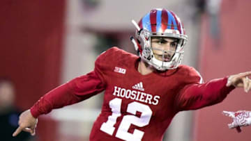 Oct 29, 2016; Bloomington, IN, USA; Indiana Hoosiers quarterback Zander Diamont (12) celebrates after scoring a touchdown in the second half of the game at Memorial Stadium. The Hoosiers won 42 to 36. Mandatory Credit: Marc Lebryk-USA TODAY Sports