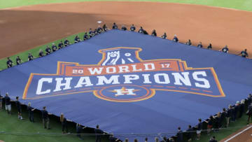 HOUSTON, TX - APRIL 02: Houston Astros display a 2017 World Series Championship banner (Photo by Bob Levey/Getty Images)